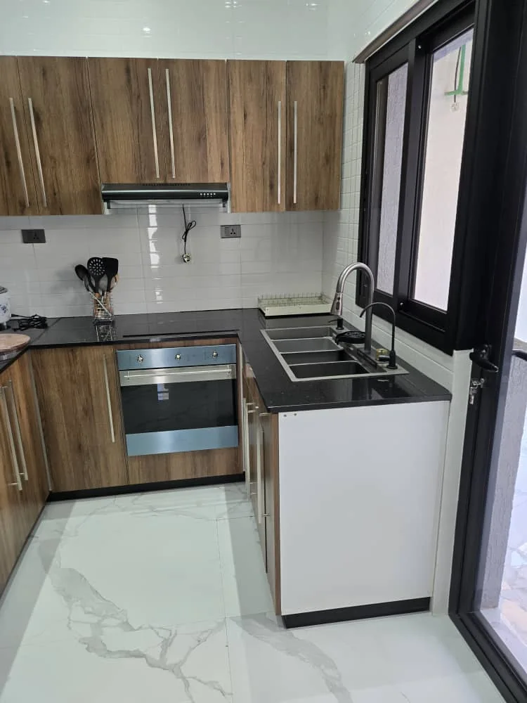 Kitchen with a sink beneath the window