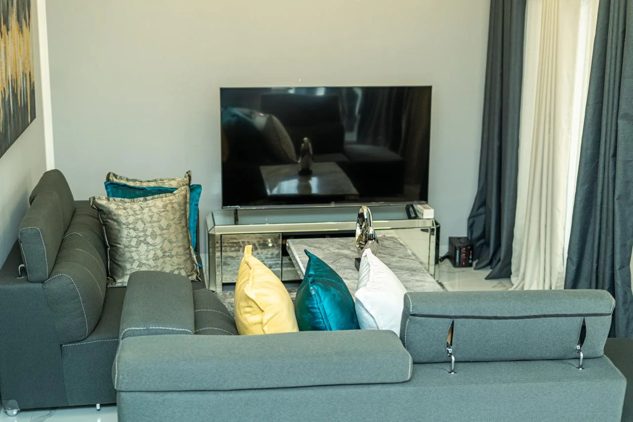 Furnished living room with television